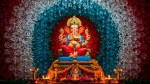 Lord Ganesha idol with colorful floral backdrop
