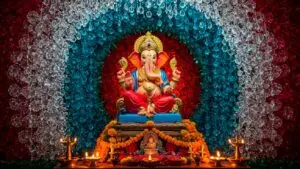Lord Ganesha idol with colorful floral backdrop