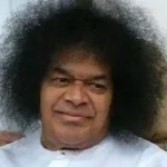 Sri Sathya Sai Baba smiling with divine compassion