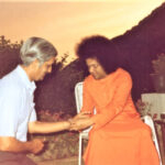 Bhagwan Shri Sathya Sai Baba blessing devoted follower