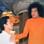 Sri Sathya Sai Baba blessing devoted seeker