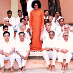 Sathya Sai Baba with Prasanthi staff image