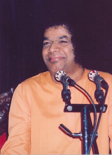 Sri Sathya Sai Baba singing devotional bhajans image