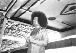 Shri Sathya Sai Baba addressing devotees with compassion