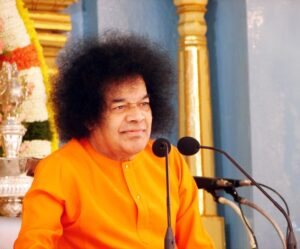 Shri Sathya Sai Baba delivering divine discourse