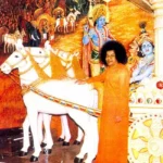 Sri Sathya Sai Baba before Lord Krishna chariot mural