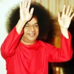 Sathya Sai Baba raising both hands
