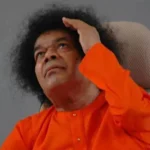 Sri Sathya Sai Baba gazing upward with divine grace