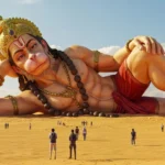 Divine Lord Hanuman Resting Across Vast Desert Landscape