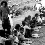 Sri Sathya Sai Baba serving humanity with compassion