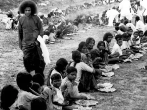 Sri Sathya Sai Baba serving humanity with compassion