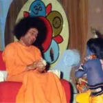 Sri Sathya Sai Baba with child Krishna