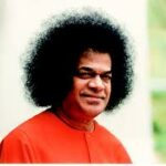 Sri Sathya Sai Baba smiling with divine compassion
