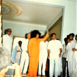 Sathya Sai Baba blessing university visitors image