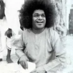 Sri Sathya Sai Baba smiling with divine joy