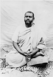 Swami Brahmananda meditating peacefully with divine wisdom and spiritual serenity always