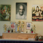 Swami Sivananda spiritual altar with deities