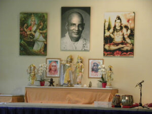 Swami Sivananda spiritual altar with deities