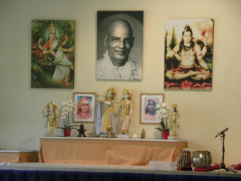 Swami Sivananda spiritual altar with deities