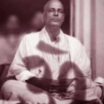 Swami Sivananda absorbed in deep meditation peacefully