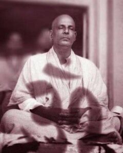 Swami Sivananda absorbed in deep meditation peacefully