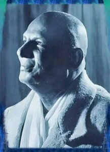 Swami Sivananda side profile portrait in deep meditation
