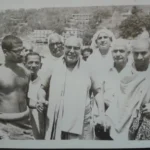 Swami Sivananda with devotees during spiritual gathering