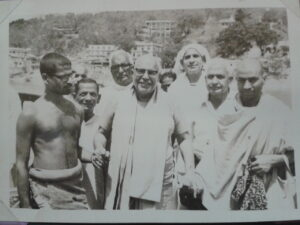 Swami Sivananda with devotees during spiritual gathering