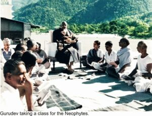 Spiritual teacher guiding students through Vedanta wisdom beside peaceful riverside together