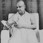 Spiritual master reading sacred scripture image