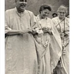 Swami Sivananda walking with devotees peacefully together