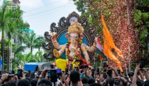 Ganesh Chaturthi procession with grand Lord Ganesha idol
