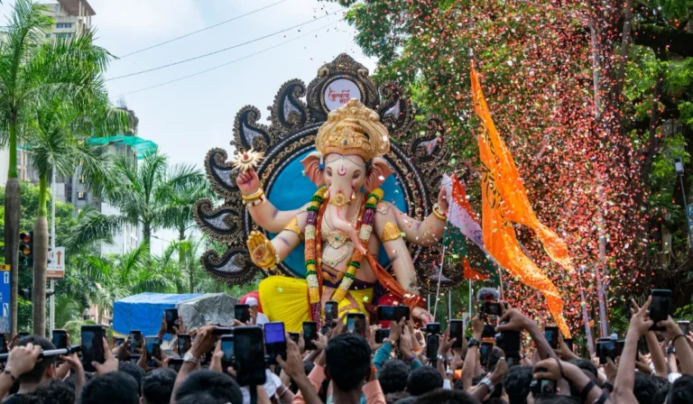 Ganesh Chaturthi procession with grand Lord Ganesha idol