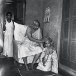 Sri Aurobindo blessing young devotee lovingly