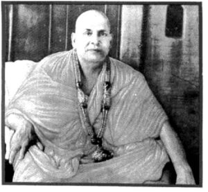 Swami Sivananda seated peacefully in meditation image