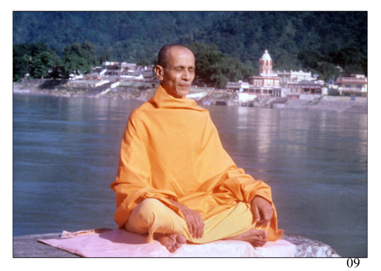 Swami Sivananda meditating peacefully on the banks of the Ganga