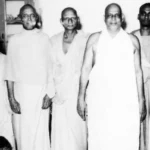 Swami Sivananda with disciples in group image