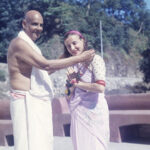Swami Sivananda blessing Swami Sivananda Radha outdoors