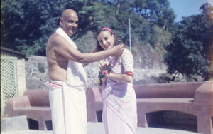 Swami Sivananda blessing Swami Sivananda Radha outdoors