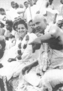 Swami Sivananda with devotees during spiritual discourse