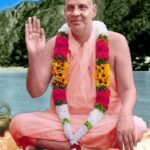 Swami Sivananda blessing devotees with raised hand