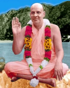 Swami Sivananda blessing devotees with raised hand
