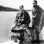 Swami Sivananda and Swami Vishnudevananda beside the sacred Ganges