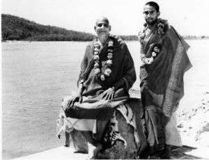 Swami Sivananda and Swami Vishnudevananda beside the sacred Ganges
