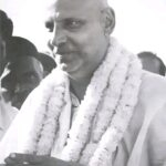 Swami Sivananda sharing timeless Vedanta wisdom peacefully