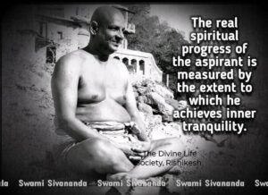 Swami Sivananda sitting with spiritual progress quote.
