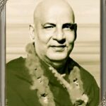 Swami Sivananda smiling spiritual portrait wearing garland