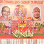 Spiritual discourse during Swami Chidananda birth centenary celebrations with devotees gathered
