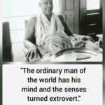 Smiling Swami Sivananda sharing spiritual wisdom
