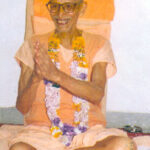 Smiling Hindu monk with folded hands and flower garland